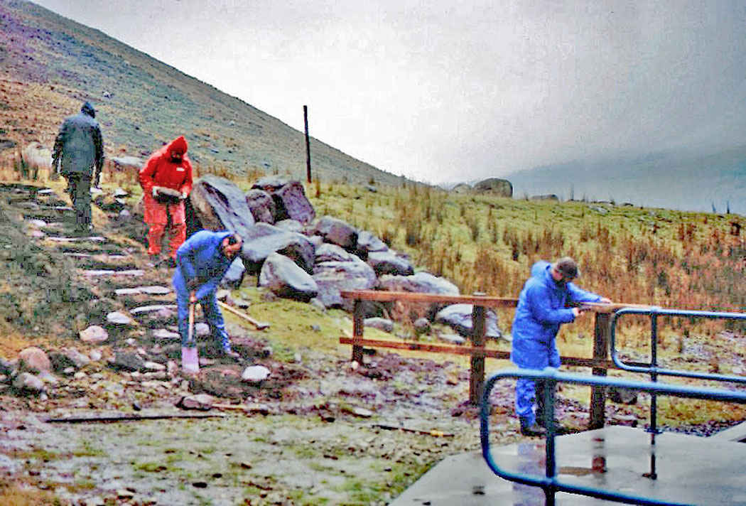 Volunteers completing steps at the top of Yeoman Hey new path.